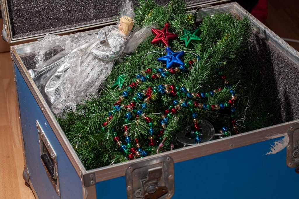 Box filled with Christmas decorations, getting packed away to UltraStor storage.